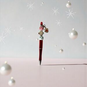 Handmade Christmas Beaded Pen – Red Candy Swirl & Bell Charm